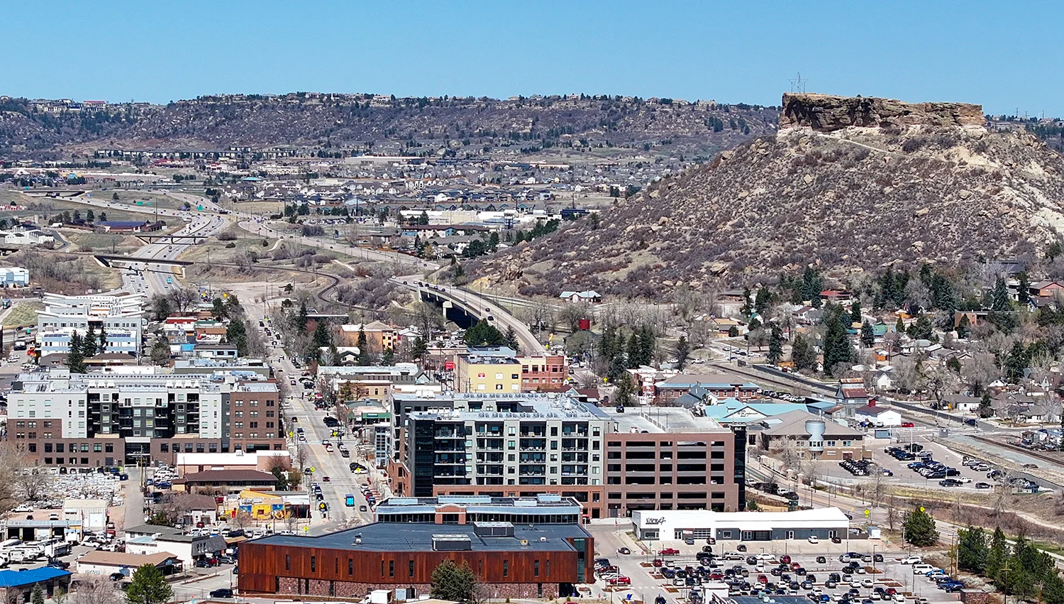 An elevated view of downtown Castle Rock and the town’s namesake rock formation